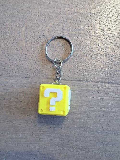 vraagteken sleutelhanger Sleutelhanger geel vraagteken blokje